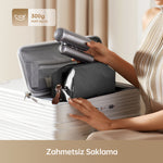 Görseli Galeri görüntüleyiciye yükleyin, Dreame Pocket saç kurutma makinesi, kompakt boyutuyla seyahat çantasında kolayca saklanabilir.

